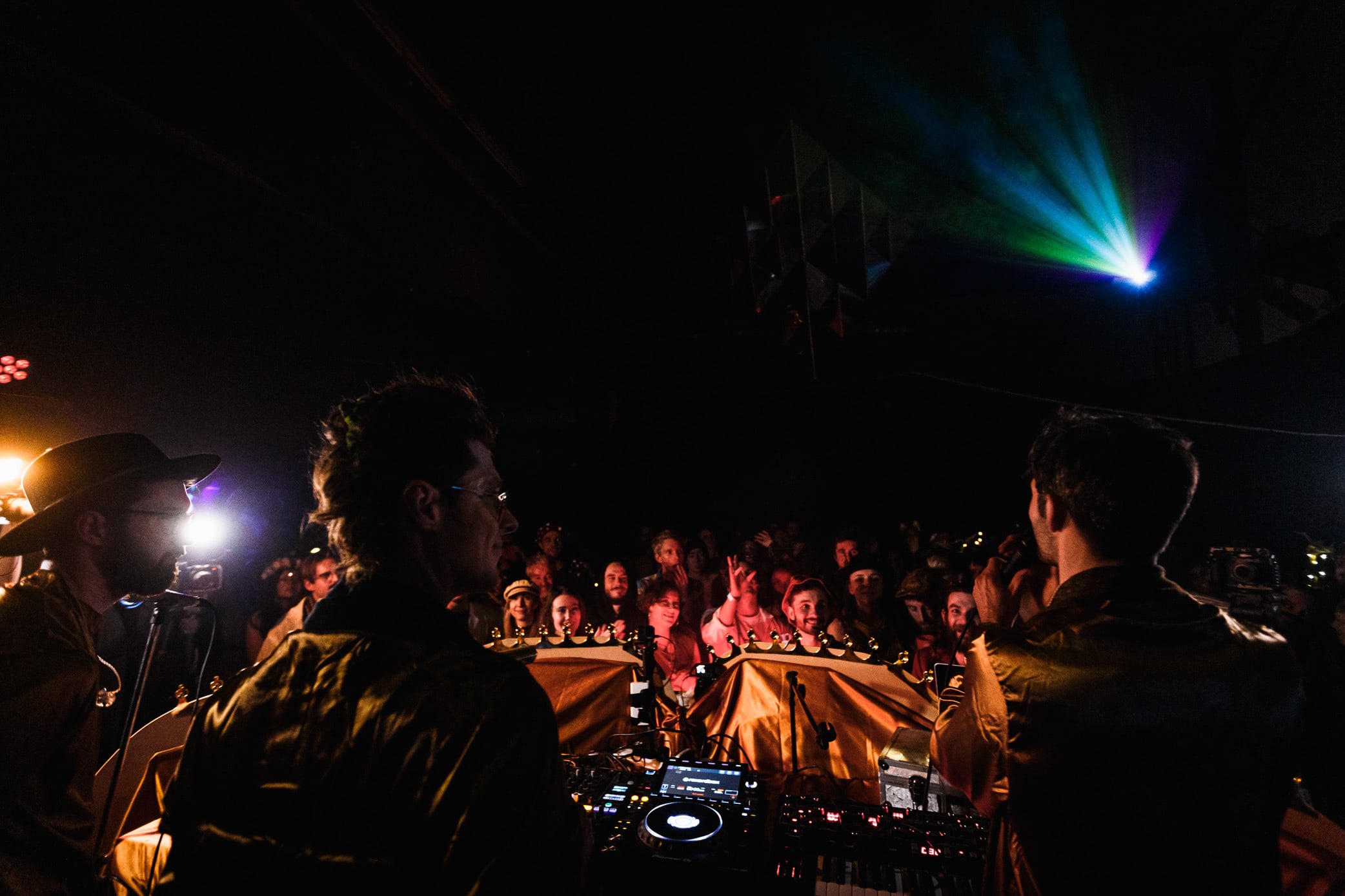 DJ playing to a packed room.